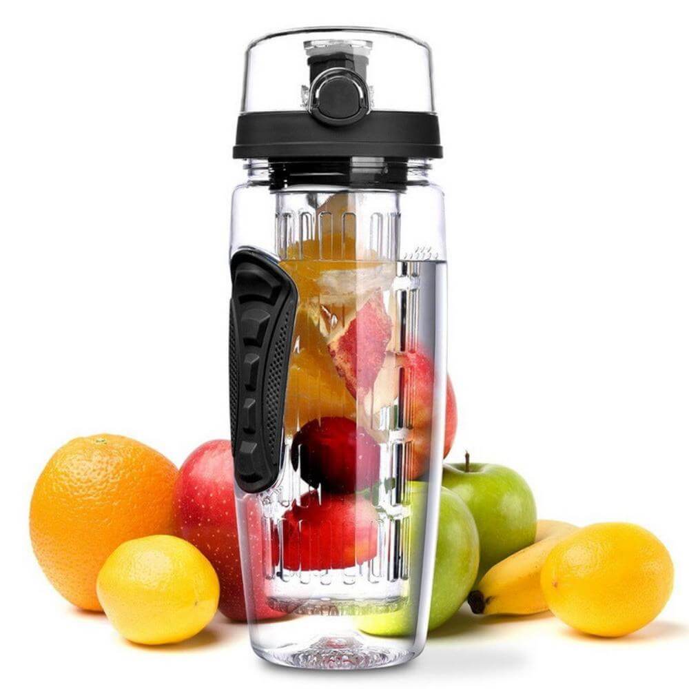 The fruit infuse water bottle in black containing various fruits. Various behind the bottle.