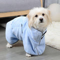 A dog wearing the microfiber dog towel in blue.