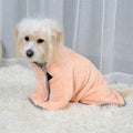 A dog wearing the microfiber dog towel in pink.