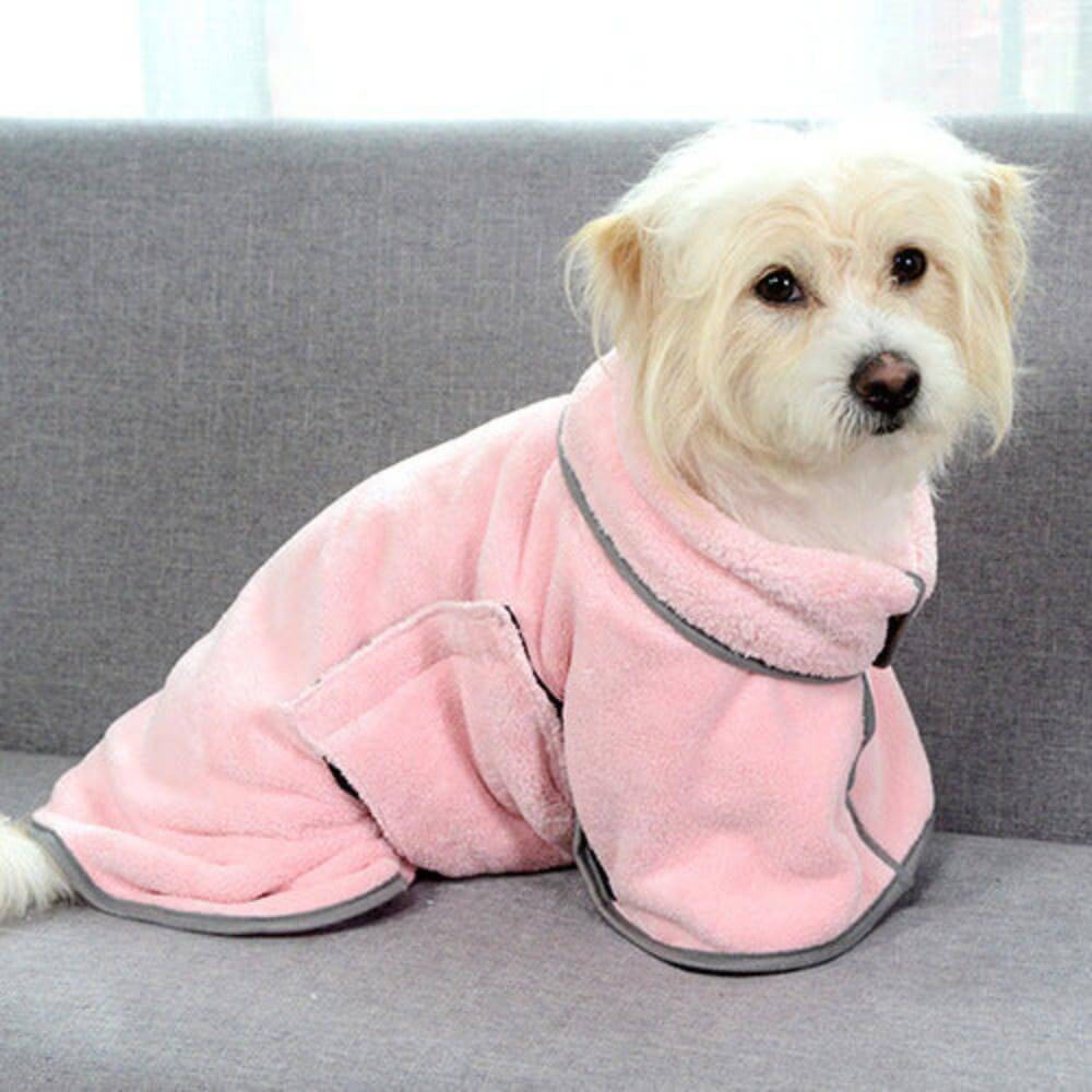 A dog wearing the microfiber dog towel in pink.