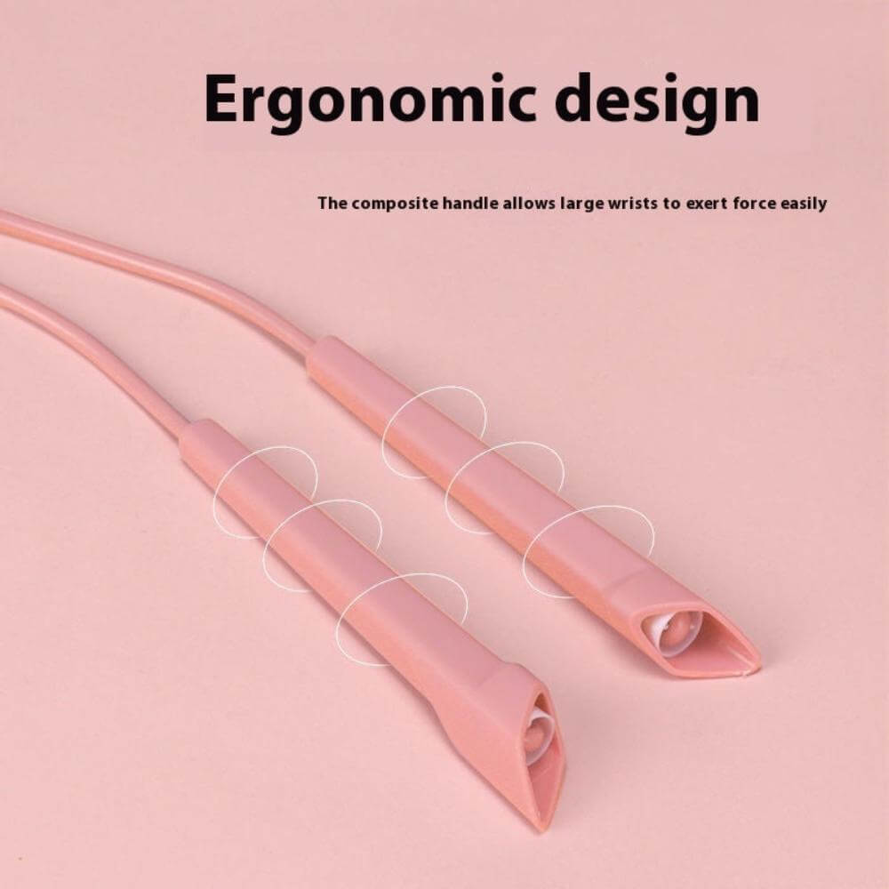 The speed skipping rope in pink, displaying its ergonomic design.